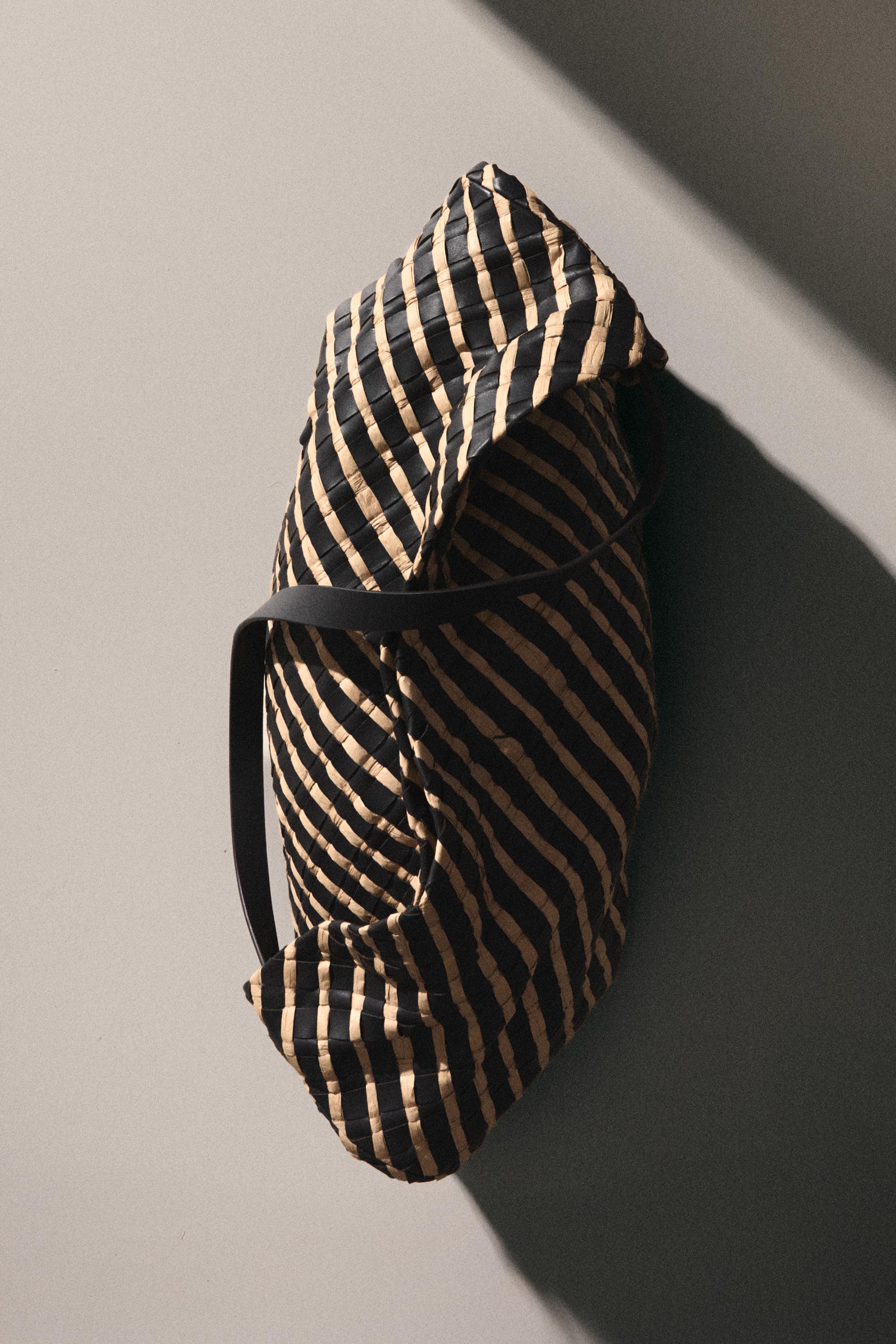 WOVEN LEATHER CLUTCH